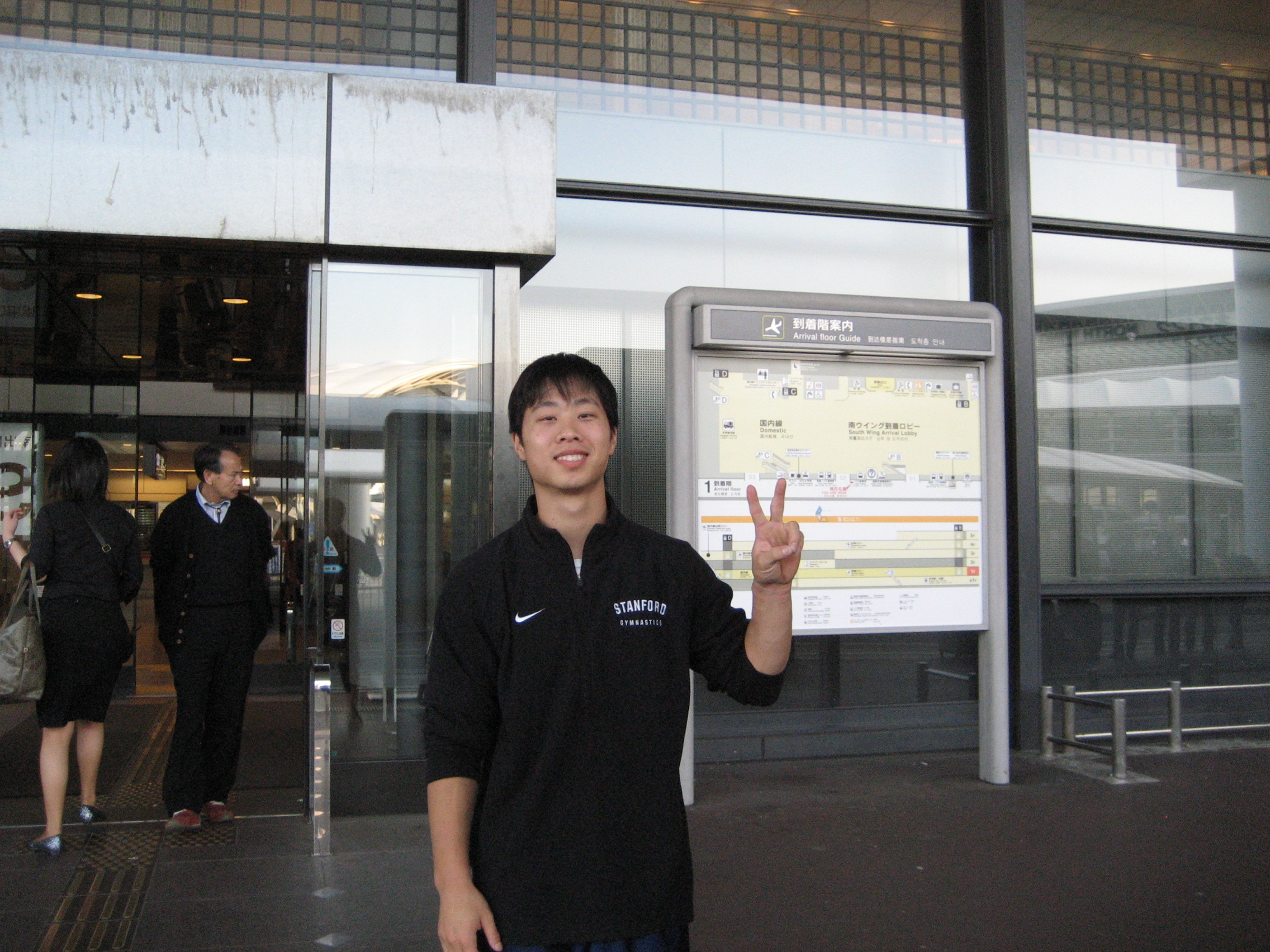 I'm finally here! Throwin' up the peace sign. Of course, I'm in Asia! It'll be my default sign for the next 3 months.